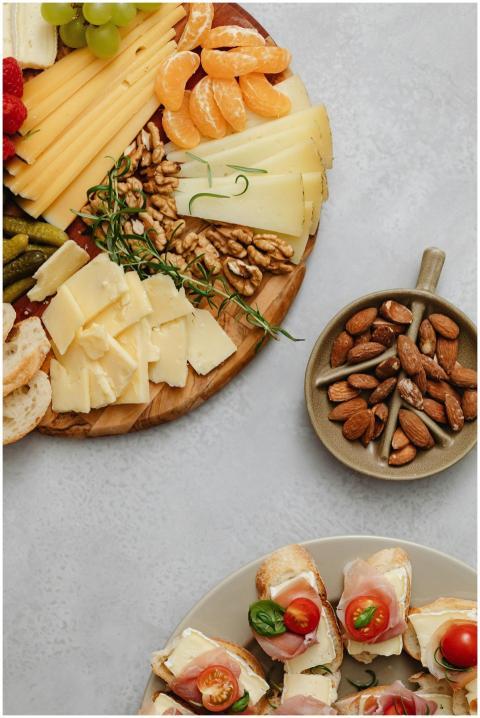 A gourmet selection of cheeses, fruits, and nuts o