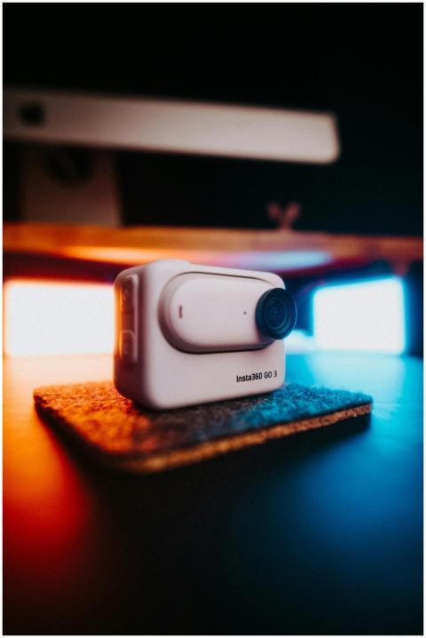 Close-up of Insta360 GO 3 camera on a desk with am