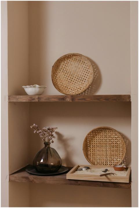 Elegant minimalist shelf featuring woven baskets a