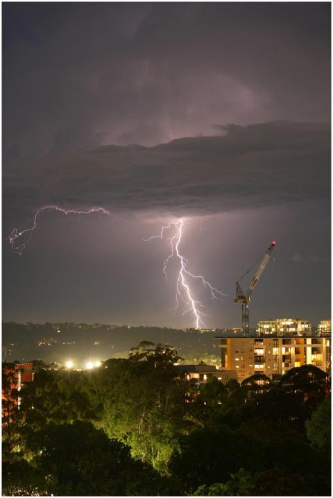 Dramatic Lightning Over Cityscape