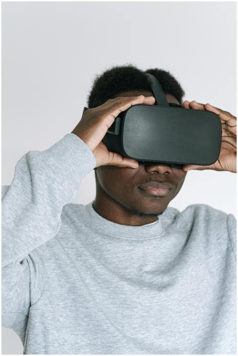 African American man wearing virtual reality heads