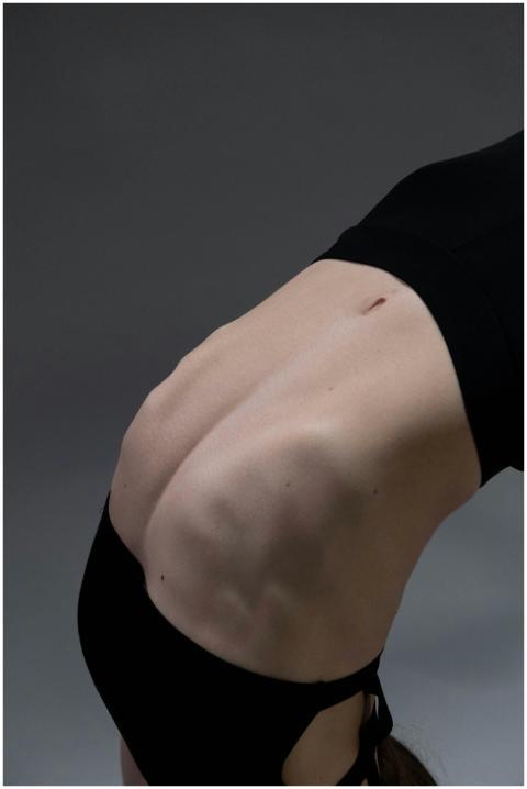 Graceful backbend yoga pose accentuating the spine