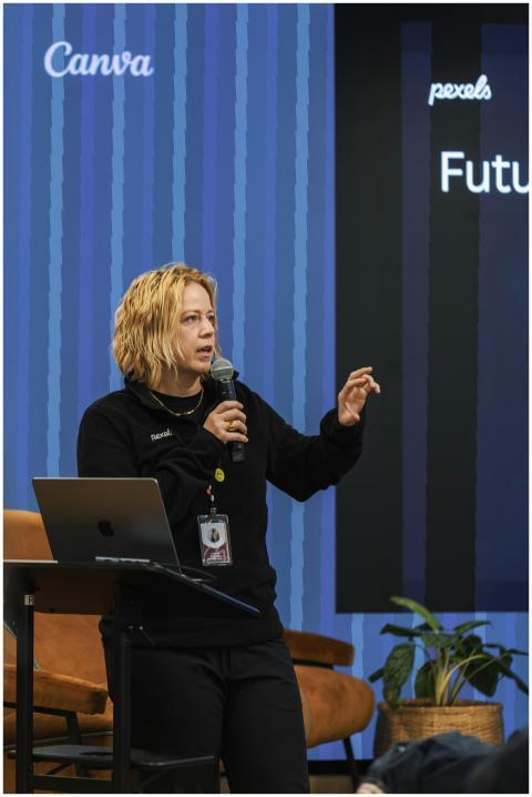 A speaker engages the audience during a tech confe