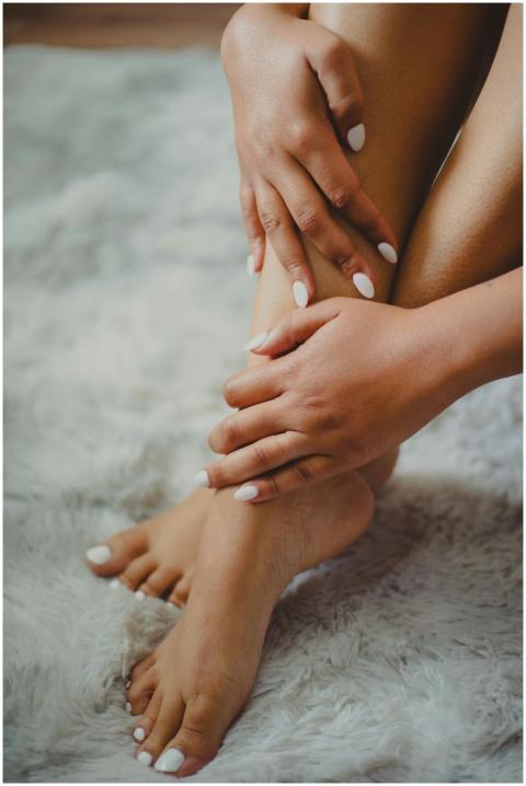 Aesthetic close-up of a woman's manicured hands an