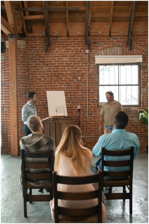 Adults attending a casual learning session in a ru
