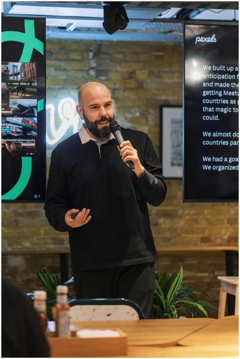 Professional speaker presenting in a modern office