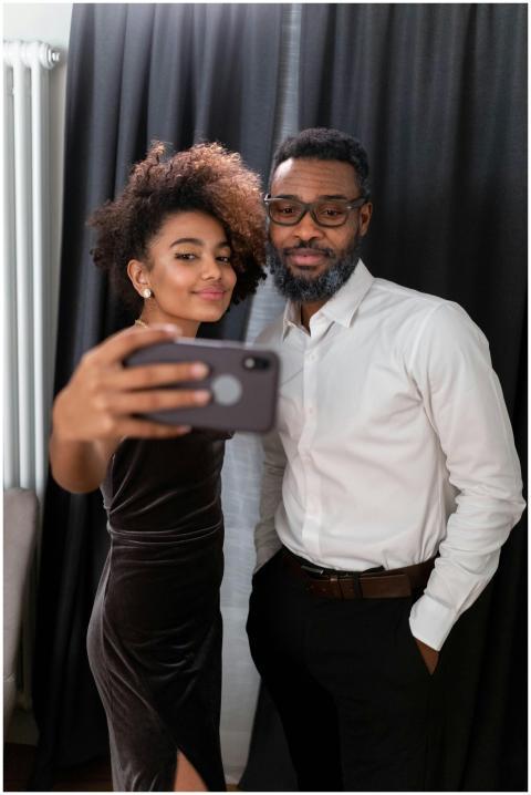 Father and daughter capture a selfie moment in for