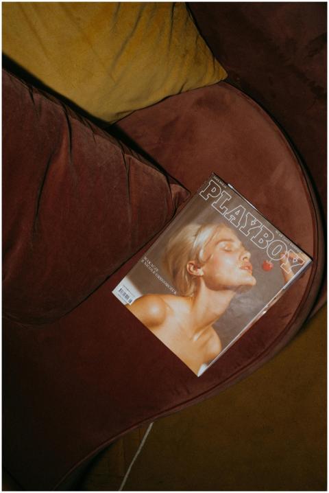 Playful composition of vintage magazine on a cozy