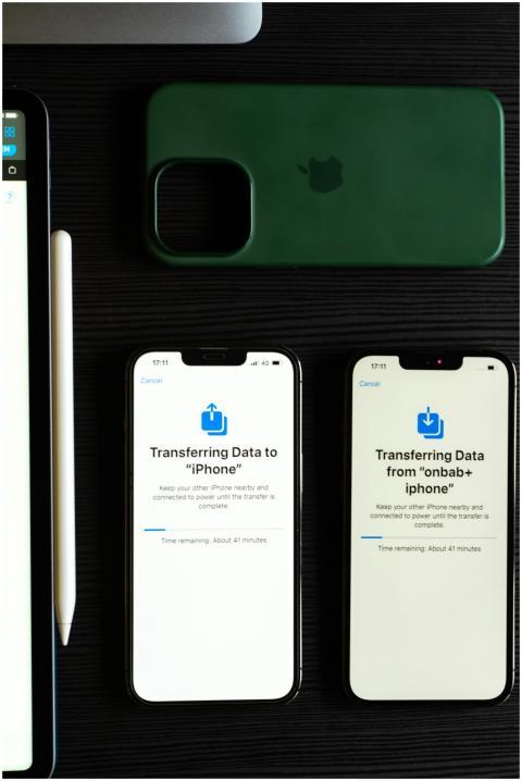 Two smartphones transferring data, showcasing mode