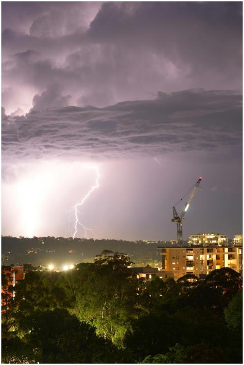 Spectacular lightning strike over city skyline at