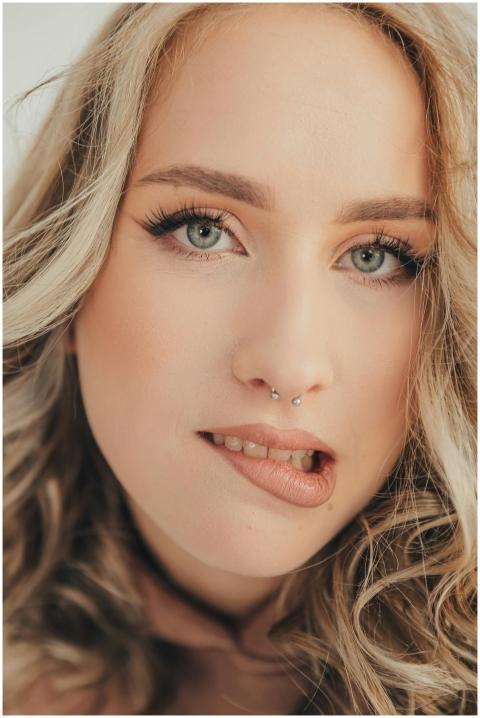 Stunning close-up portrait of a woman with long bl