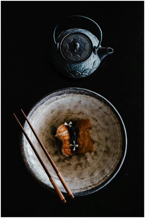 Captivating overhead shot of sushi served with cho