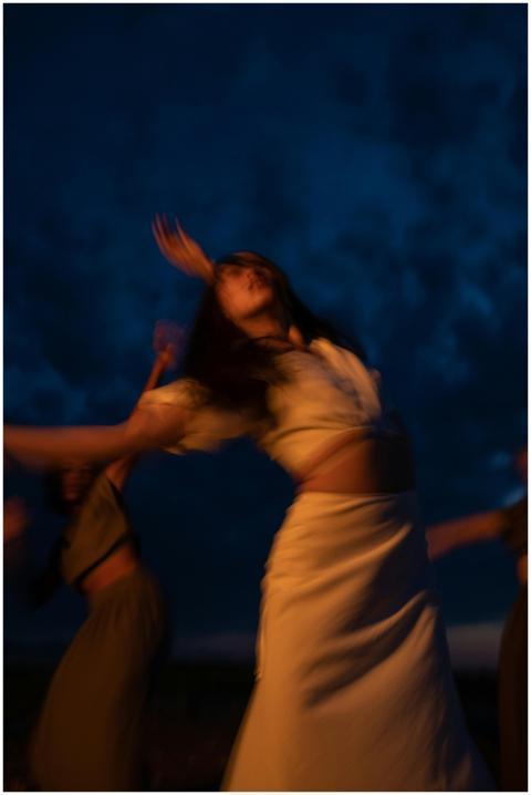 Blurred movement of women dancing joyfully during