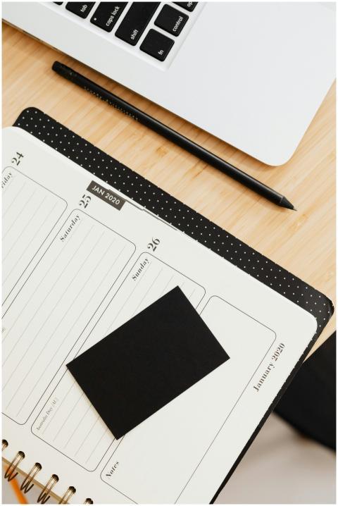 Top view of a minimalist office desk setup featuri