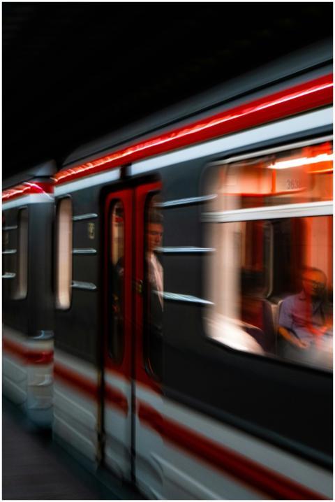 Dynamic shot of a metro train in motion highlighti