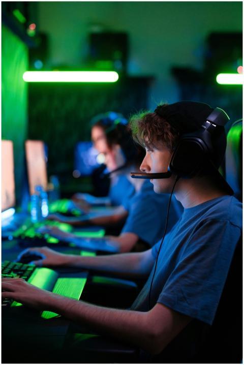 Intense gaming session with teens in a cybersport