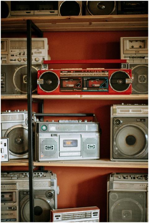 A diverse collection of vintage radios and boombox