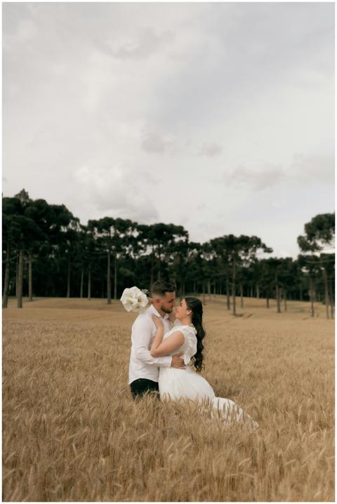 A couple shares an intimate moment in a serene whe