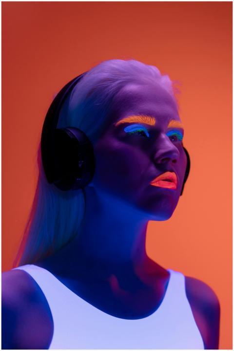 Colorful neon portrait of a woman with fluorescent