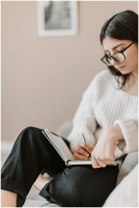 Attentive female wearing eyeglasses and casual out