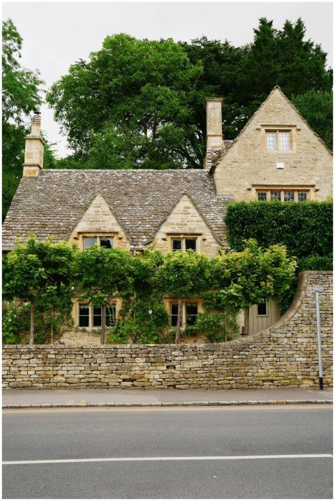 Charming stone cottage in rural England, surrounde