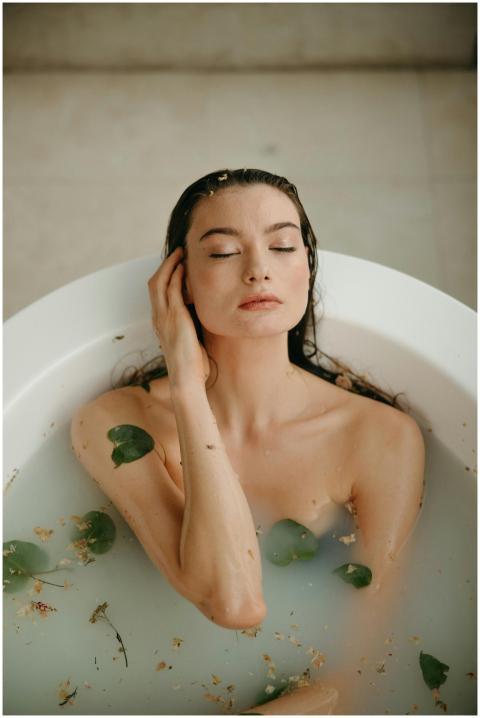 Serene woman in bathtub enjoying a relaxing self-c