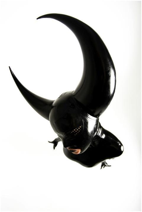 Intriguing image of a person in a sleek black horn