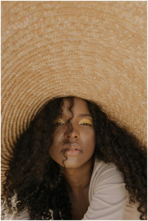 Captivating portrait of a woman with bold makeup u