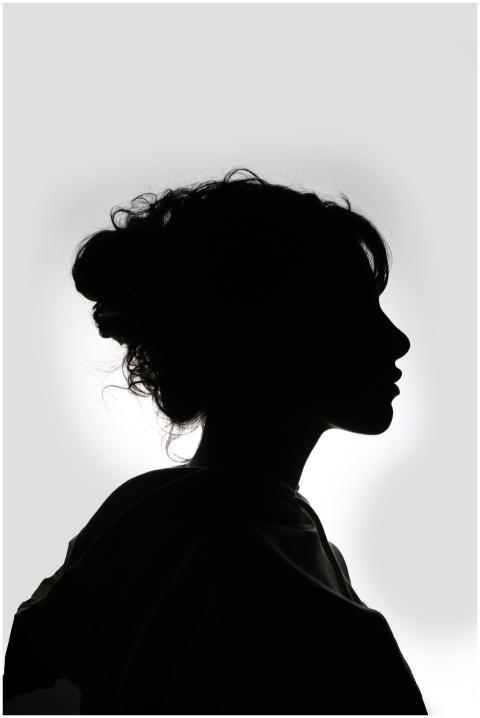 Striking black and white silhouette of a woman in