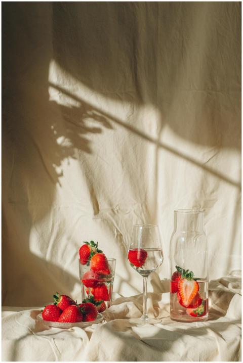 Beautiful still life of strawberries in glasses an