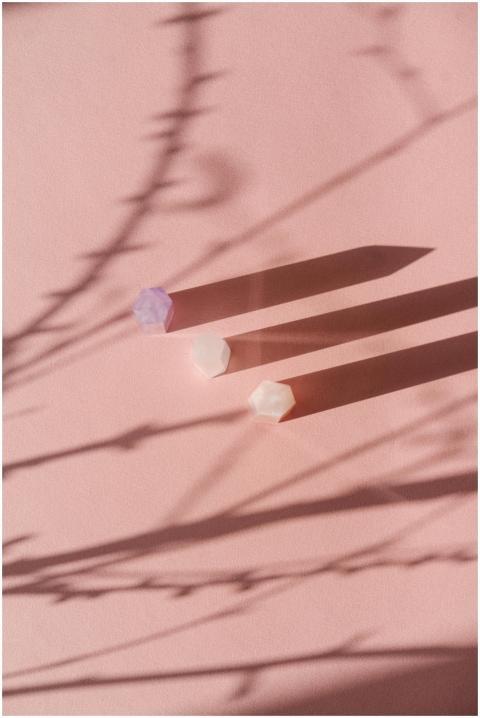 Artistic composition of three crystals casting lon