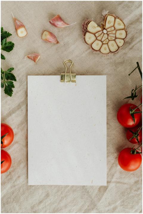 Top view of empty clipboard with golden paper bind