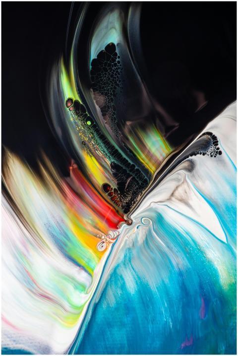 Dynamic abstract artwork featuring vibrant swirlin