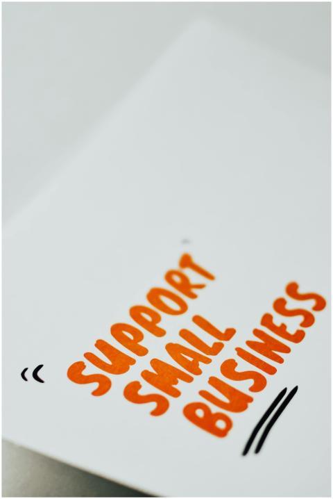 Close-up of a 'Support Small Business' message in