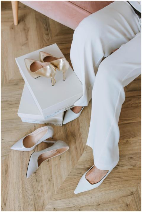 Close-up of a woman trying on elegant high heels i