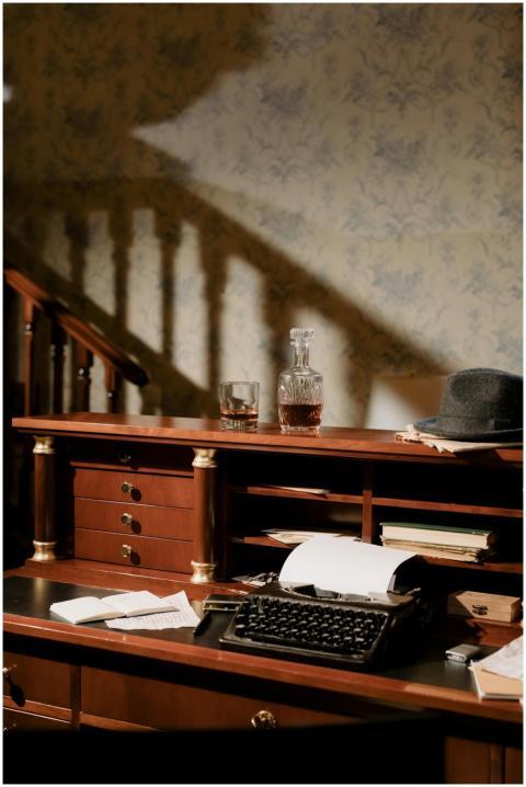 A retro workspace setup featuring a vintage typewr