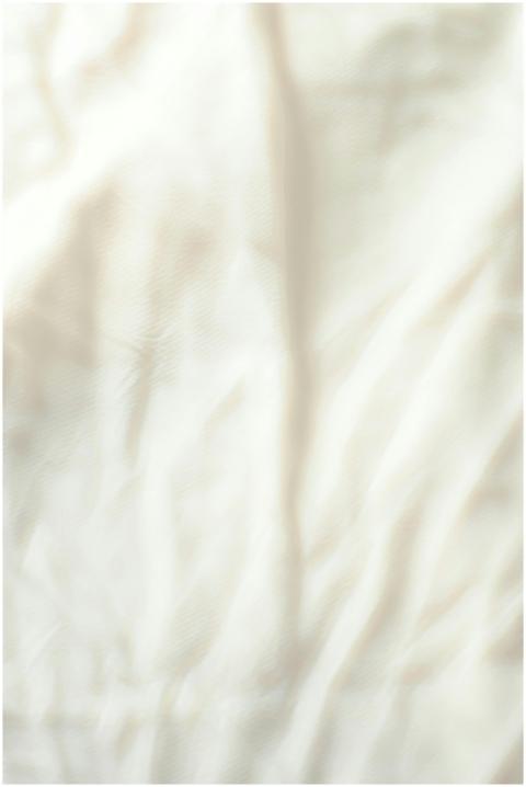 Close-up of a white fabric showcasing its texture