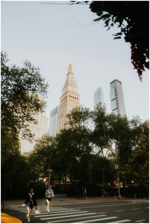 A dynamic street scene in Manhattan with skyscrape