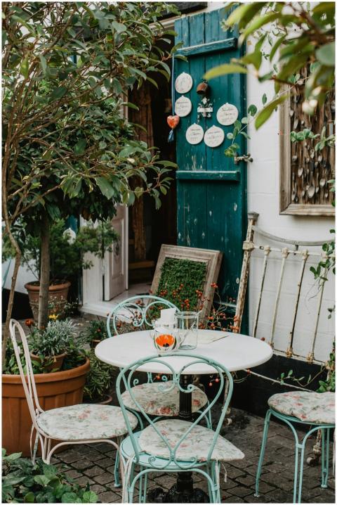 Charming outdoor café setting with vintage furnitu