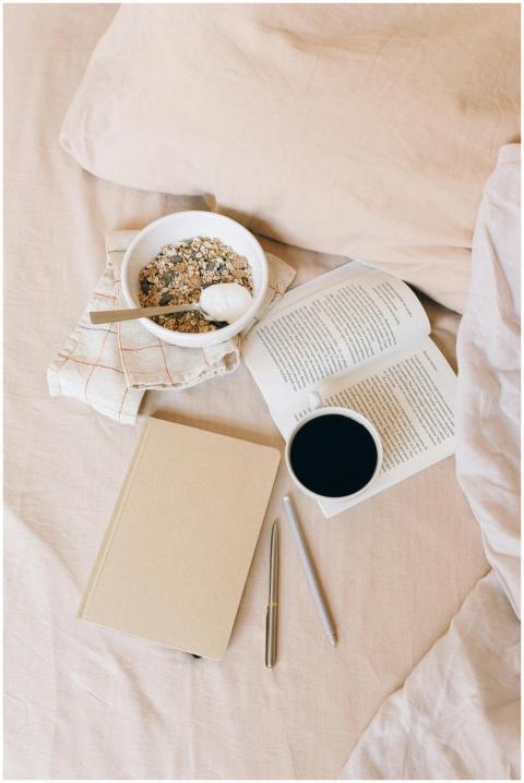 Cozy morning scene with a cup of coffee, open book