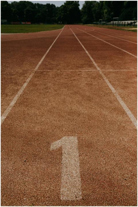Close-up view of a track lane marked with the numb