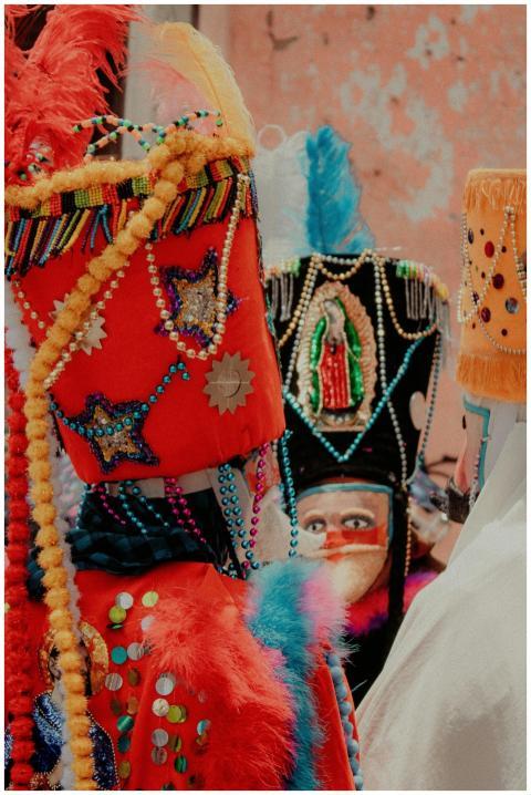 Colorful traditional costumes with intricate beadw