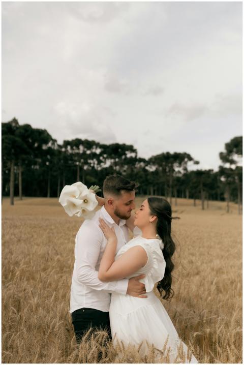 A couple shares an intimate moment in a serene whe