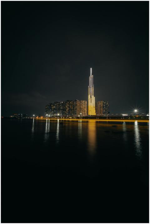 Nighttime view of Landmark 81 skyscraper reflected
