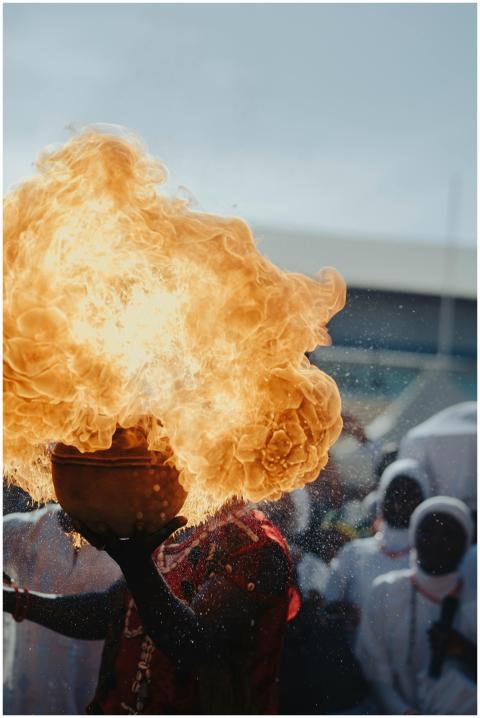 A dynamic scene of a traditional fire ritual with