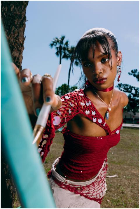 Portrait of a woman artist painting outdoors in a