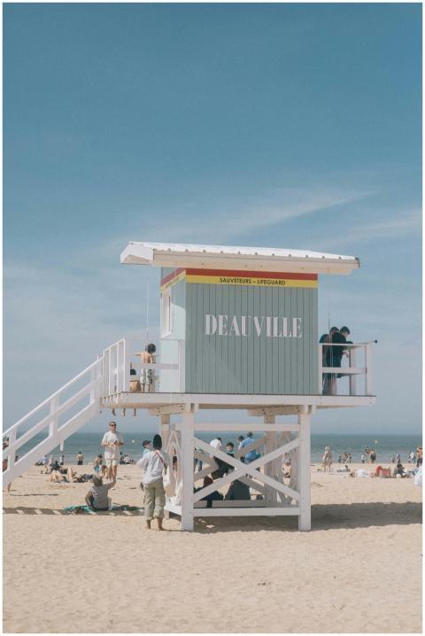 A busy summer day at Deauville Beach with sunbathe