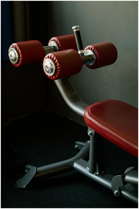 Close-up of red padded gym equipment in a fitness