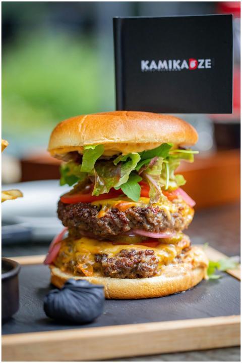 Delicious double cheeseburger with lettuce, tomato