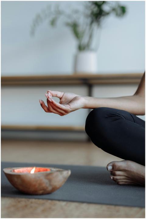 Close-up of a person's hand performing a yoga mudr